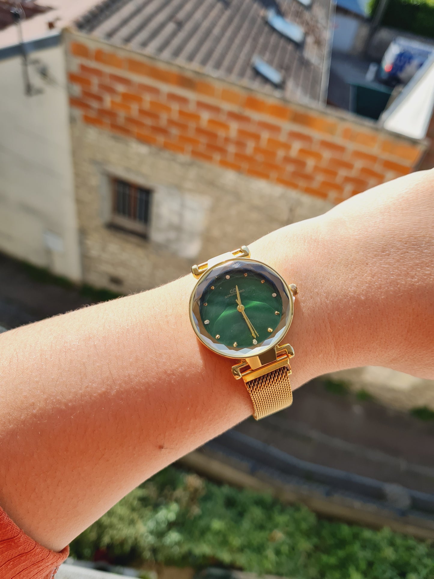 Montre Éclat doré fond vert