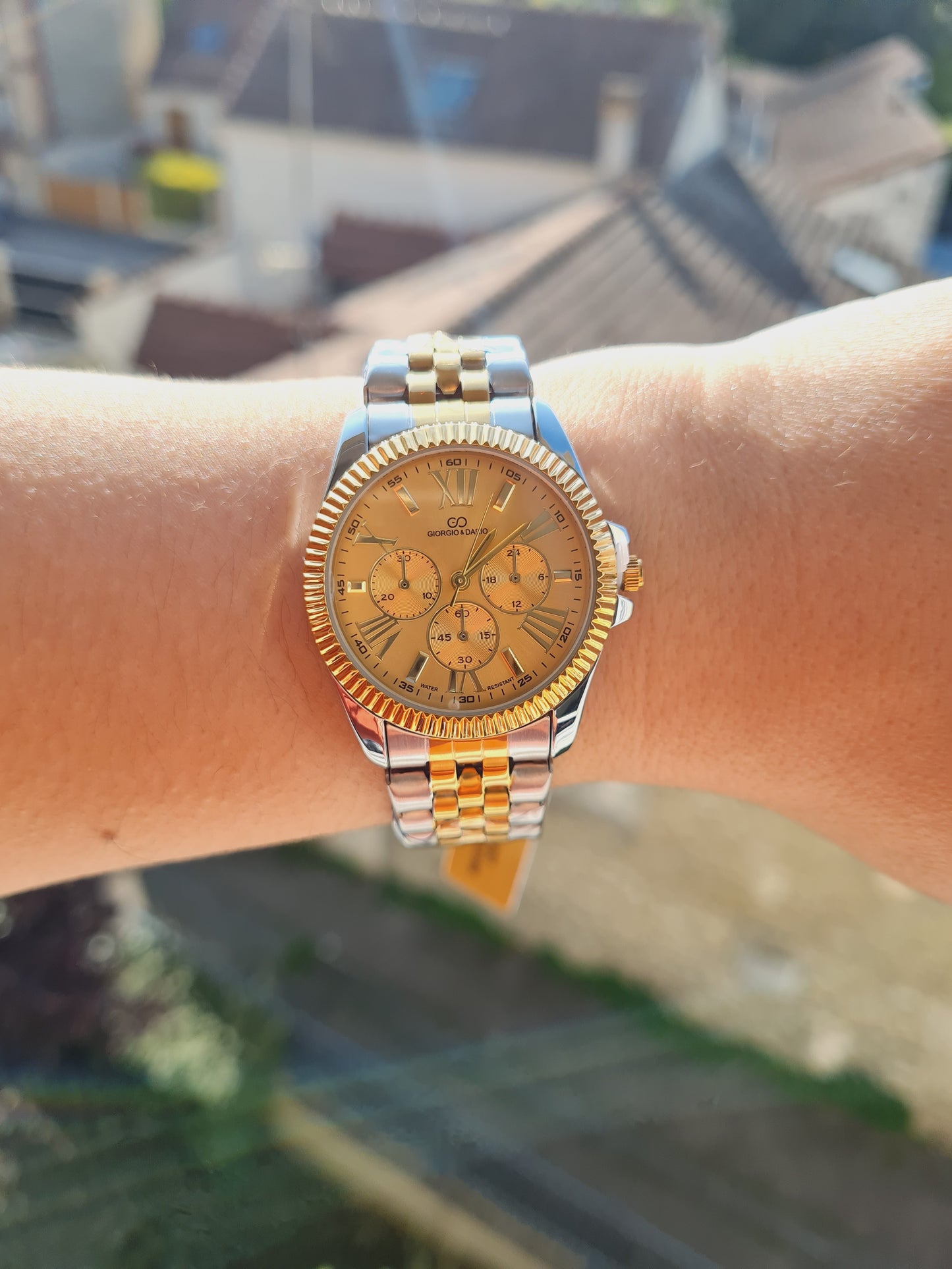 Montre Diva argenté doré fond doré