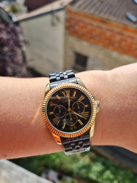 Montre Diva noire doré fond noire