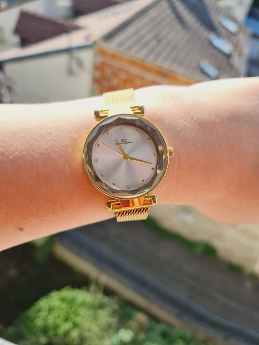 Montre Éclat doré fond blanc