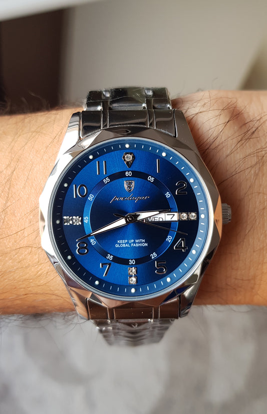 Montre Océan bleu argenté fond bleu foncé