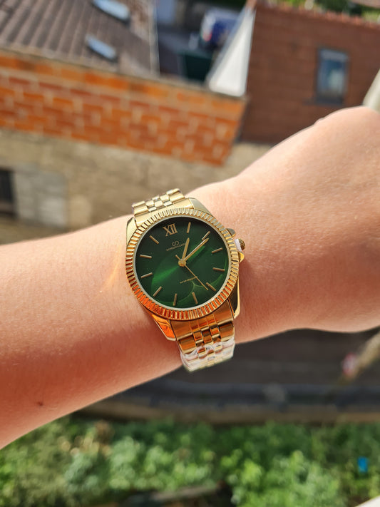 Montre Diva doré fond vert